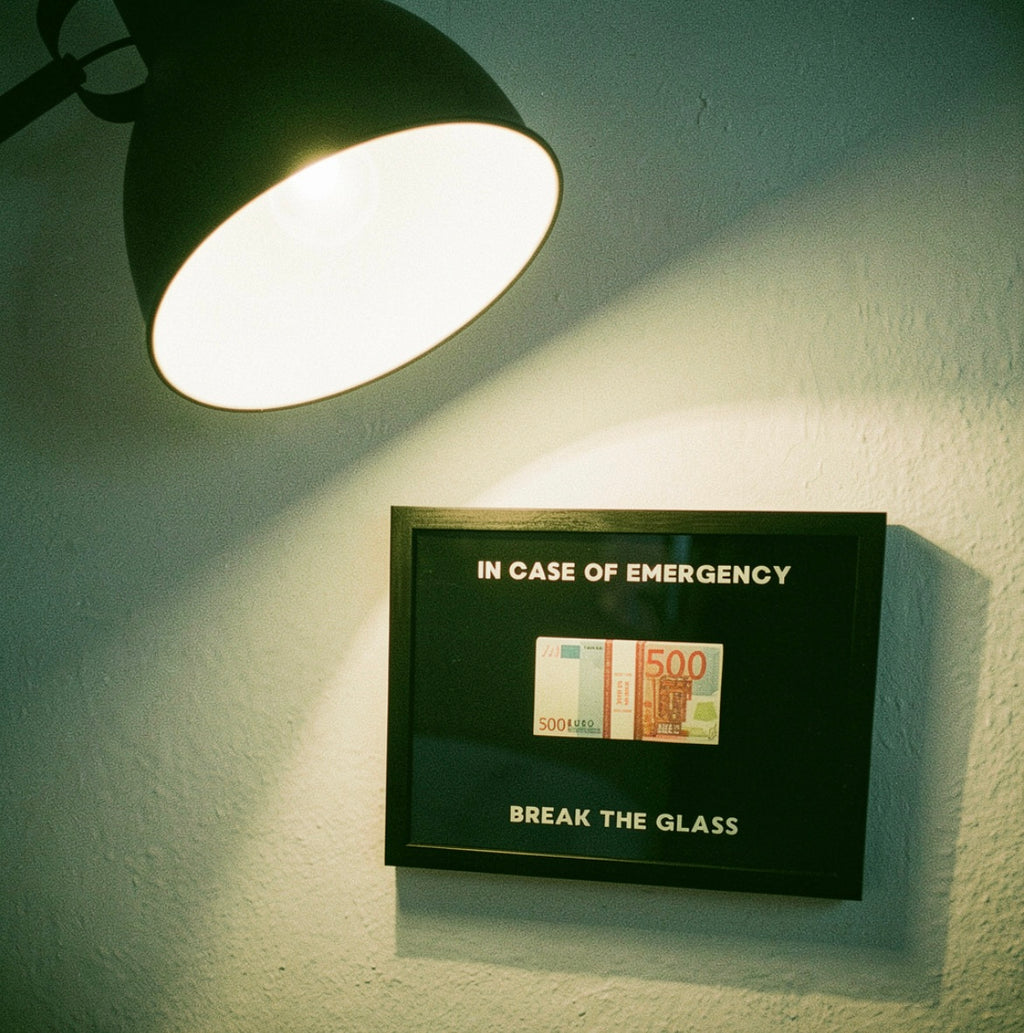 "IN CASE OF EMERGENCY BREAK THE GLASS"